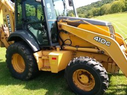 
										2005 John Deere 410G full									